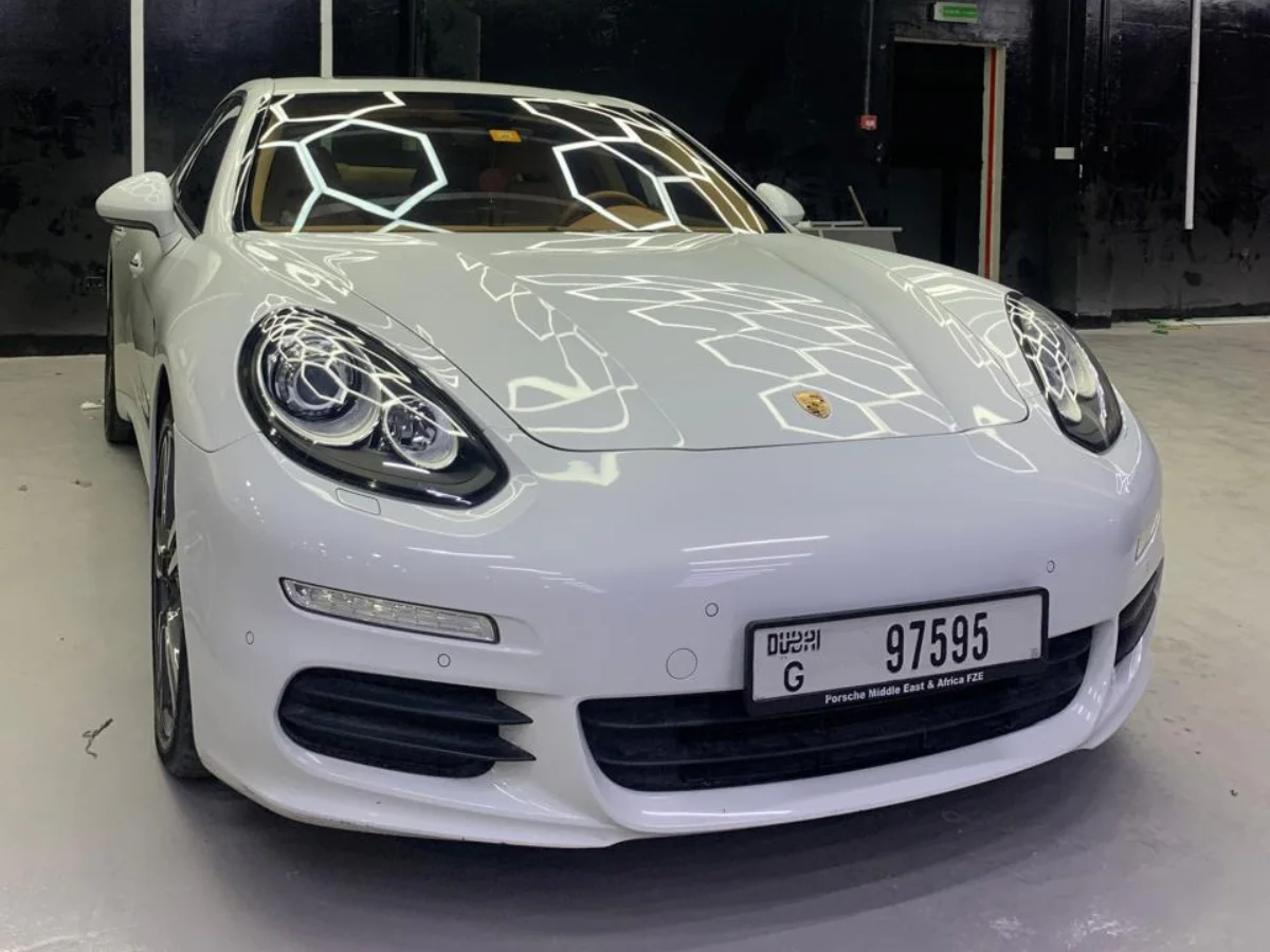 Porsche Panamera in the hexagon-lit detailing studio